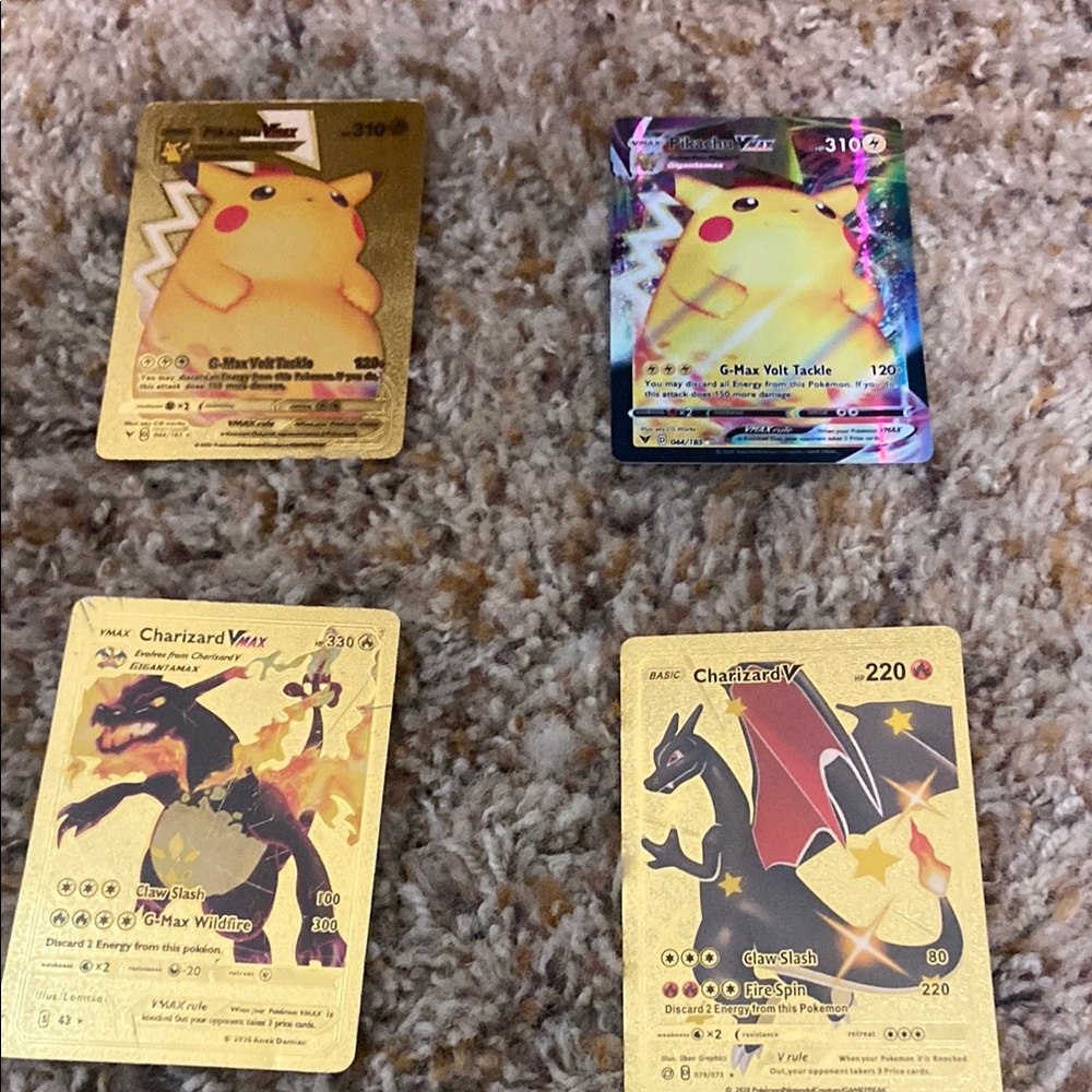 Pokemon Pikachu and Charizard VMAX Gold Cards
